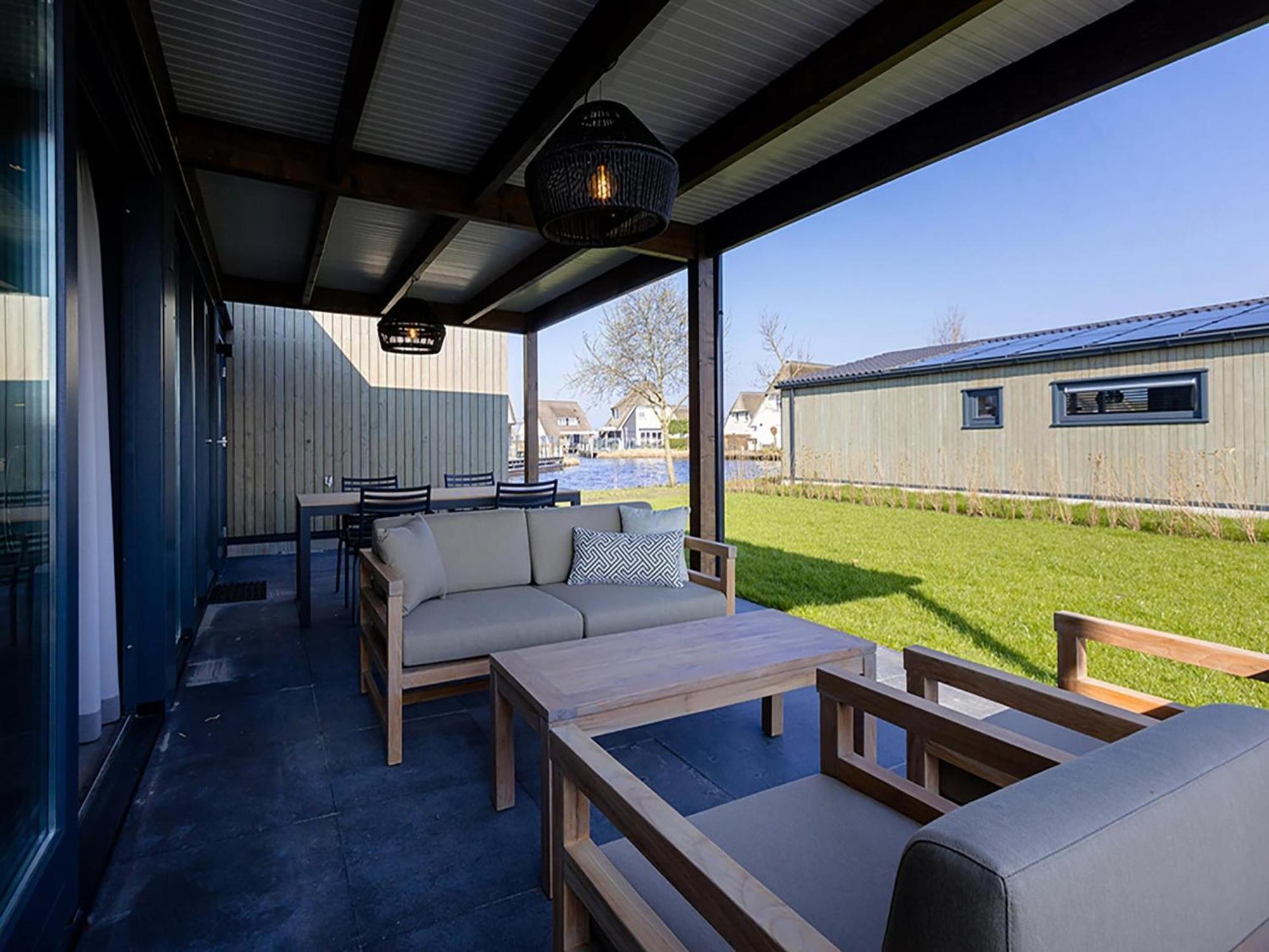 Luxury Docklodge On The Water Delfstrahuizen Экстерьер фото